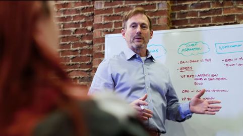 Mark Donnolo working at the whiteboard