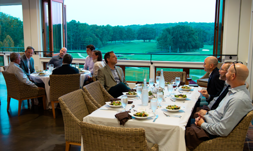 Sales compensation leaders enjoying dinner together